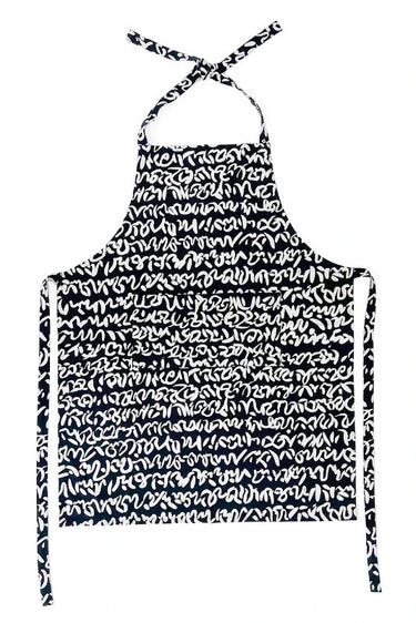 See Design Apron, Story Black. Avaliable at Welcome Home Annapolis.