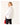 Woman wearing a white shirt and black pants with a red handbag on a white background