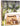 Book cover of 'India Hicks: Entertaining, with a Side of Chaos' by Britain's Brittan Gibbs, featuring a tropical outdoor scene with a woman in a yellow dress under a white canopy tent.