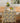 blue-grey table runner or long placemat featuring a repeating yellow lemon print