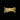 Gold leaf-patterned object on a black background