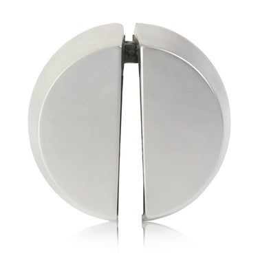 White spherical object with a central cutout on a white background