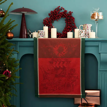 Les Cadeaux De Noel Houx Jacquard Kitchen Towel Hanging on a mantel