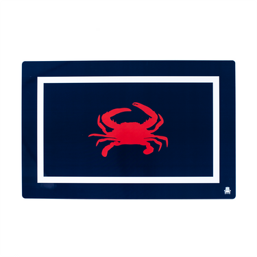 Navy blue placemat with a red crab design on a white background