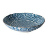 Ceramic bowl with blue floral pattern on a white background