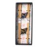 Set of chopsticks with decorative butterfly ends in a box with a floral pattern