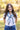 Model has silk scarf around shoulders Shown from front
