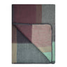 Folded fabric with geometric pattern on a white background