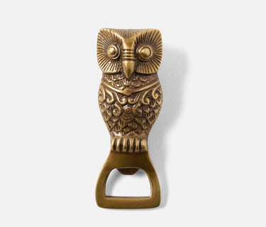 Metal bottle opener in the shape of an owl. Antique brass finish.