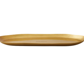 Elongated candle plate with turned up edges, gold in color