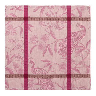 Pink fabric with peacock and floral pattern on a white background