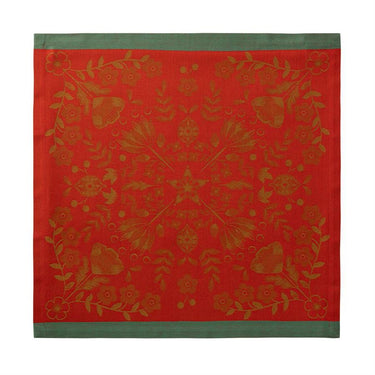 Red fabric with gold floral pattern and green border on a white background