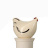 Ceramic chicken on a white background