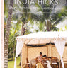 Book cover of 'India Hicks: Entertaining, with a Side of Chaos' by Britain's Brittan Gibbs, featuring a tropical outdoor scene with a woman in a yellow dress under a white canopy tent.