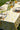 Cream tablecloth featuring vibrant yellow lemons 