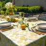 Cream tablecloth featuring vibrant yellow lemons 