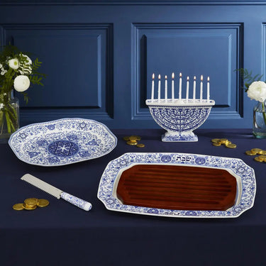 Spode Judaica Menorah Shown with candles and accessories.