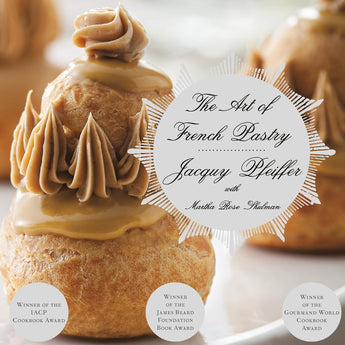 The Art of French Pastry by Jacquy Pfeiffer with Martha Rose Shulman. Winner of the IACP Cookbook Award, Winner of the James Beard Foundation Book Award, Winner of the Gourmand World Cookbook Award. Cover features neutral background with gold decals and photo of a French pastry.