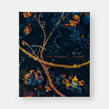 Book cover with floral design and text 'Emily Thompson Flowers' on a dark background