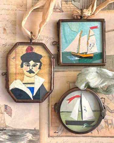 Trio of Miniature art lockets.