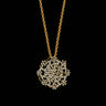 Queen Anne’s lace pendant on a gold chain