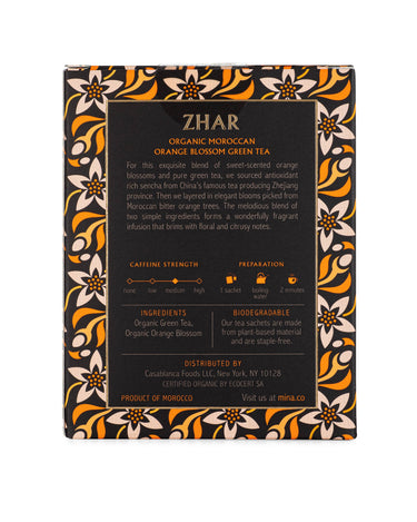 Zhar Organic Moroccan Orange Blossom Green Tea packaging with decorative floral patterns on a white background