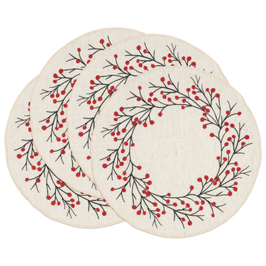 Three round off-white placemats with a black and red berry wreath pattern, arranged in an overlapping stack on a white background.