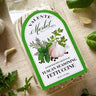 Valente Market pasta package with green label on a beige surface with herbs